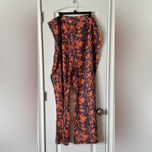PrettyLittleThing Plus Orange Print Beach flares, size 22